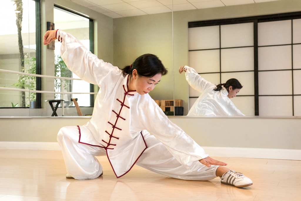 Tai Chi lessons Tai chi lessons pose in front of mirror